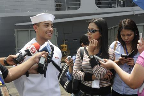 MANILA, Republic of the Philippines (March 23, 2012) --Information Systems Technician Seaman Jan Romnick Escano from U.S. 7th Fleet flagship USS Blue Ridge (LCC 19) addresses the media from the Republic of the Philippines after the ship pulls into Manila for a port visit. While in port, Blue Ridge and embarked 7th Fleet staff Sailors and Marines will strengthen ties between the two countries through community service events, combined military training and cultural exchanges. MANILA, Republic of the Philippines (March 23, 2012) --Information Systems Technician Seaman Jan Romnick Escano from U.S. 7th Fleet flagship USS Blue Ridge (LCC 19) addresses the media from the Republic of the Philippines after the ship pulls into Manila for a port visit. While in port, Blue Ridge and embarked 7th Fleet staff Sailors and Marines will strengthen ties between the two countries through community service events, combined military training and cultural exchanges.