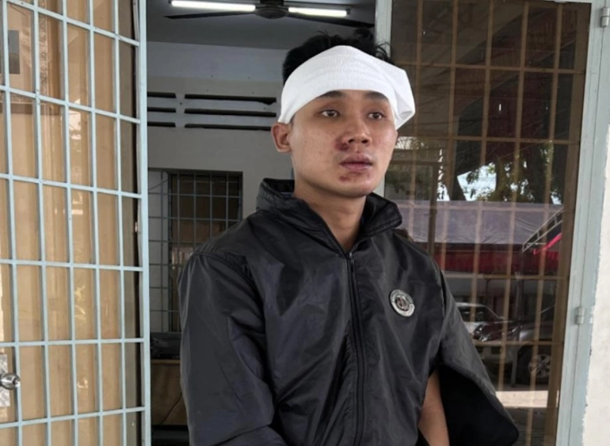 Tùng tại cơ quan điều tra. Ảnh: Hà Mi