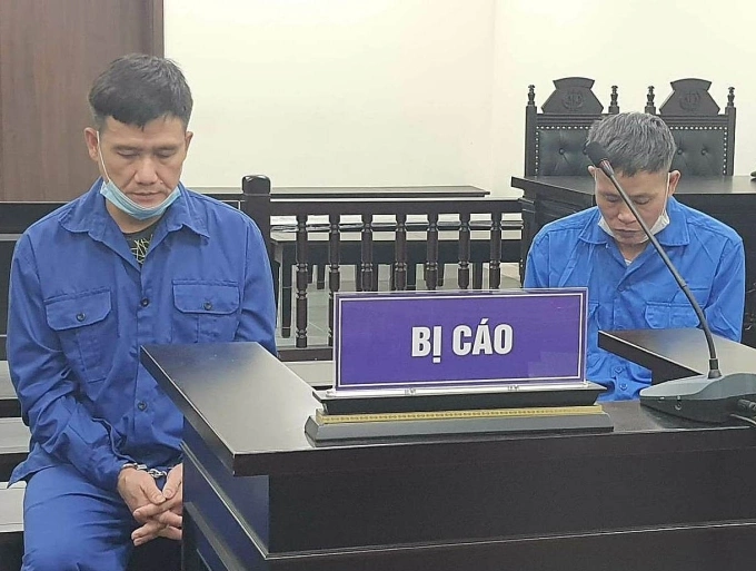 Bị cáo Cường (trái) và Hải tại tòa ngày 10/2. Ảnh: Danh Lam