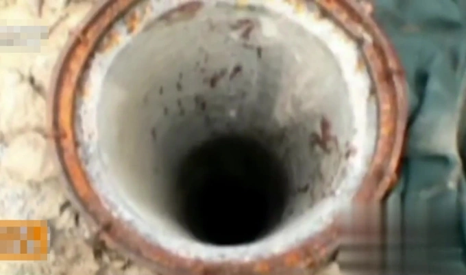 Cảnh sát tìm thấy đầu của nạn nhân trong giếng nước. Ảnh: Toutiao