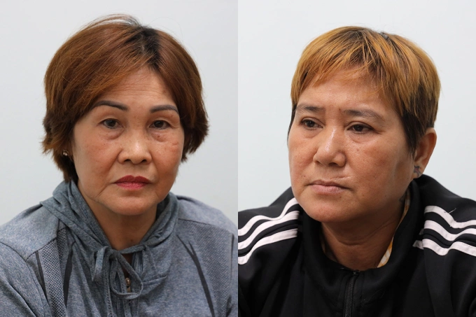 Nguyễn Thị Hoa (trái) và Nguyễn Thị Huỳnh Lan tại cơ quan điều tra. Ảnh: Hồng Tuyết