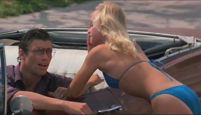 Tammy Lynn Leppert đóng vai cô gái mặc bikini đánh lạc hướng tài xế trong bộ phim kinh điển Scarface năm 1983. Ảnh: Universal Pictures