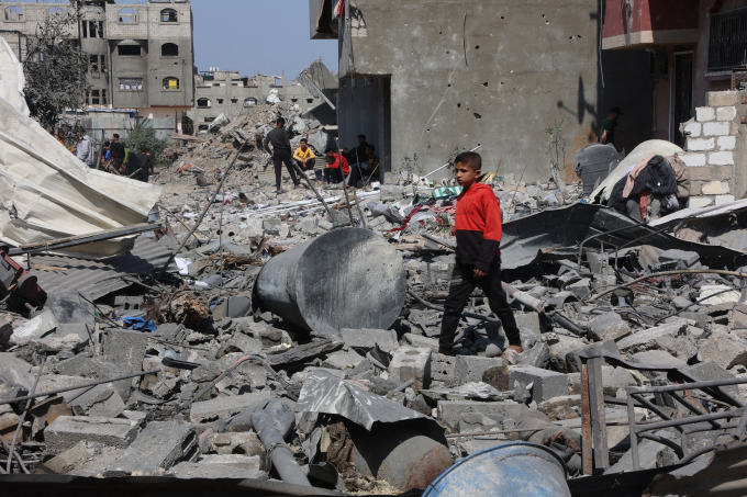 Những ngôi nhà bị phá hủy tại quận Shujaiya, phía đông Gaza City, sau cuộc không kích hôm 18/3 của Israel. Ảnh: AFP
