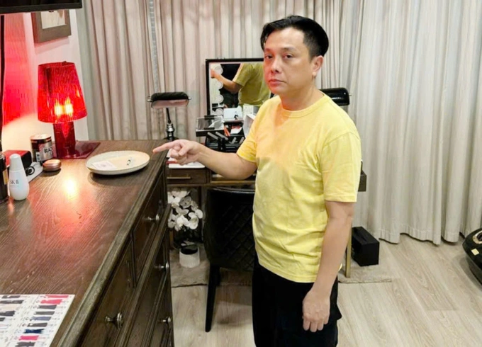Ông Nguyễn Công Trí lúc bị bắt. Ảnh: Công an TP HCM