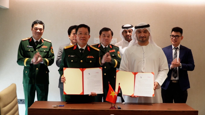 Viettel và ABI đã ký Biên bản cuộc họp, thể hiện rõ thiện chí và mong muốn tăng cường hợp tác. Ảnh: Bộ Quốc phòng