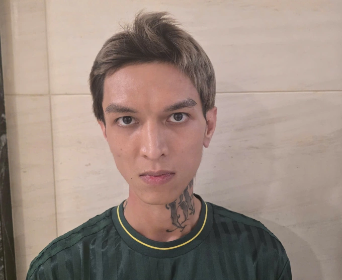 Rapper Bình Gold lúc bị bắt. Ảnh: Công an cung cấp