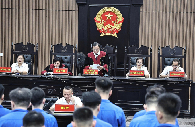 Thẩm phán chủ tọa Nguyễn Ngọc Huân tuyên án chiều 29/7. Ảnh: Danh Lam