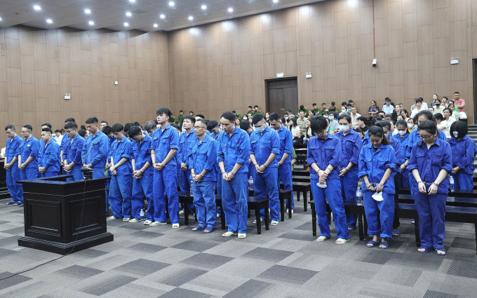 Các bị cáo nghe tuyên án chiều 29/7. Ảnh: Danh Lam