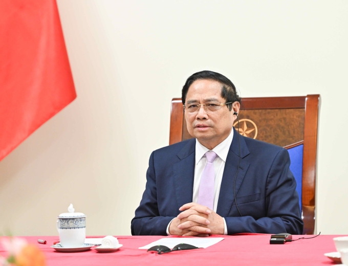 Thủ tướng Phạm Minh Chính điện đàm với Thủ tướng Malaysia Anwar Ibrahim. Ảnh: VGP