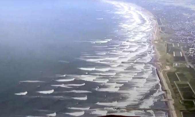 Sóng thần tương đối nhẹ tràn vào bờ biển thành phố Tateyama ở quận Chiba, Nhật Bản sau động đất 8,8 độ ngoài khơi Nga. Ảnh: SRL