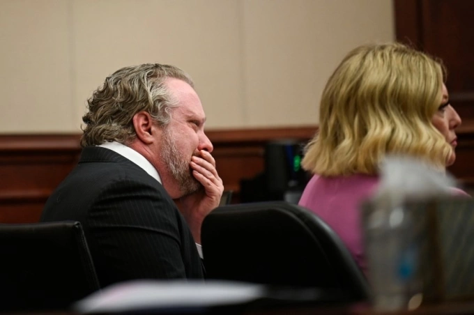 James Craig khóc khi mở đầu phiên tòa ngày 15/7. Ảnh: Denver Gazette