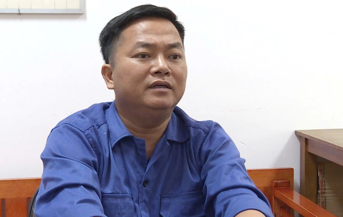 Trần Văn Tuấn tại cơ quan điều tra. Ảnh: Công an cung cấp