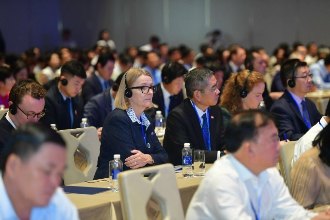 Hội nghị triển khai Nghị quyết của Quốc hội về Trung tâm tài chính Quốc tế tại Việt Nam, diễn ra ở TP HCM, sáng 2/8 thu hút nhiều nhà đầu tư tài chính trong và ngoài nước. Ảnh: Thanh Tùng