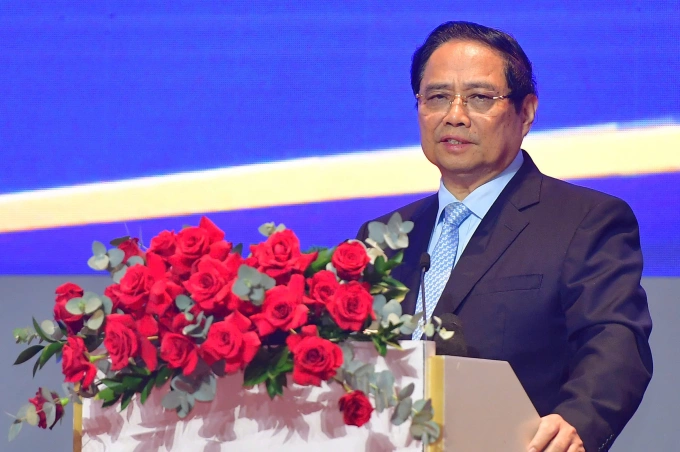Thủ tướng Phạm Minh Chính phát biểu tại hội nghị triển khai Trung tâm tài chính tại Việt Nam, sáng 2/8. Ảnh: Thanh Tùng
