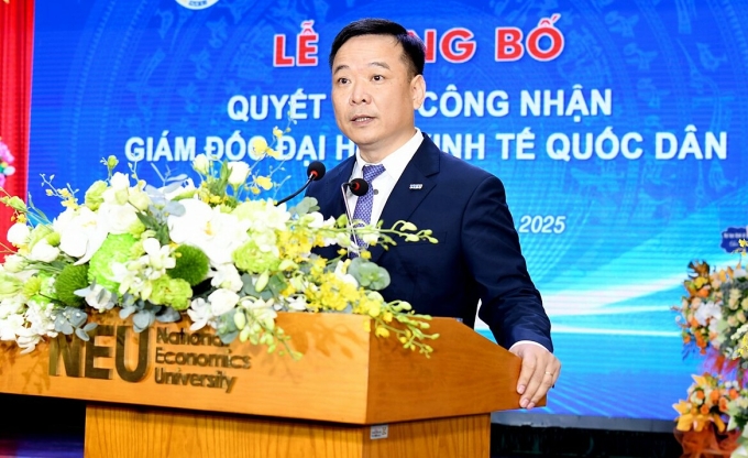 PGS.TS Bùi Huy Nhượng tại Lễ công bố công nhận giám đốc Đại học Kinh tế Quốc dân, sáng 4/8. Ảnh: NEU