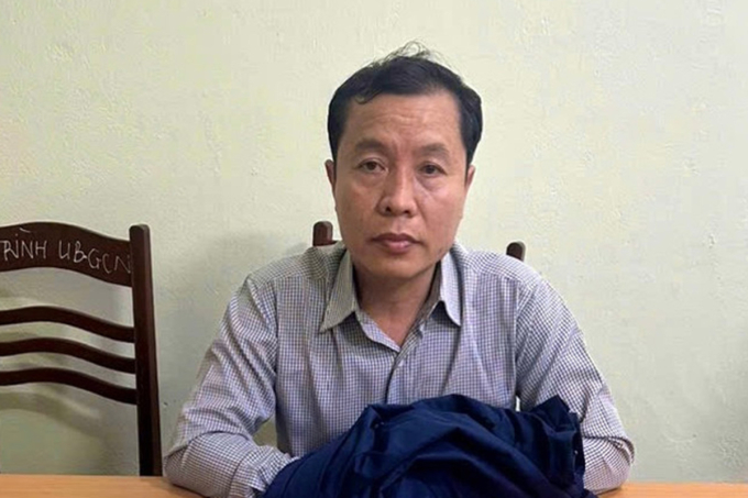 Phạm Quang Đạo lúc bị bắt. Ảnh: Ngọc Oanh