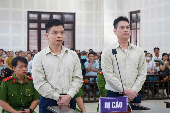 Bị cáo Lê Trọng Linh (trái) và Trương Quốc Thái tại tòa. Ảnh: Ngọc Hoa