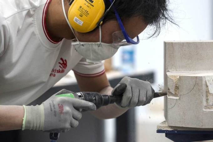 Một học viên người Trung Quốc tham gia kỳ thi kỹ năng nghề thế giới ở Nga. Ảnh: YEGOR ALEEV/TASS