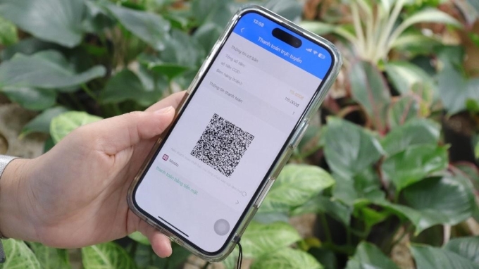 Mỗi đơn hàng COD giao bởi BEST Express được tạo mã QR MoMo riêng trên ứng dụng của shipper. Ảnh: BEST Express