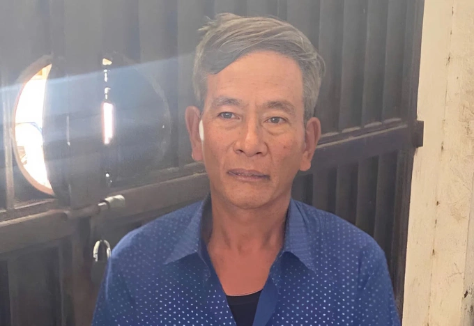 Ông Nguyễn Đình Sơn lúc bị bắt. Ảnh: Công an cung cấp