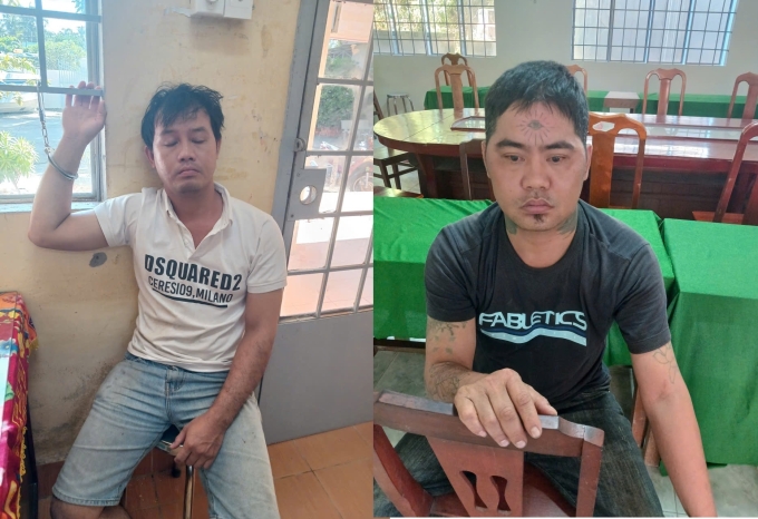 Nguyễn Bảo Huy và Nguyễn Văn Bình tại cơ quan công an. Ảnh: Công an cung cấp