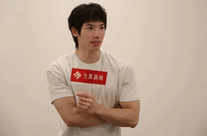 Tiêu Tùng Dịch trả lời phỏng vấn ngày 8/8. Ảnh: Jiupai News