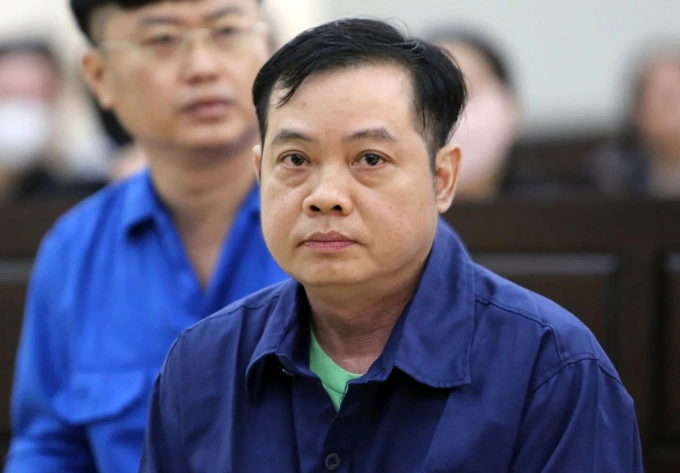 Bị cáo Lê Anh Xuân trong lần ra tòa sơ thẩm. Ảnh: Phước Tuấn