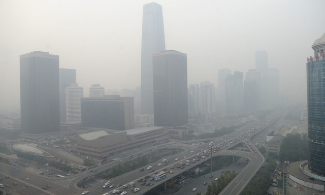 Các tòa nhà chìm trong màn sương mù dày đặc ở Bắc Kinh, Trung Quốc tháng 10/2013. Ảnh: AFP AFP-20131028-XxjpbeE001445-201-1151-1432