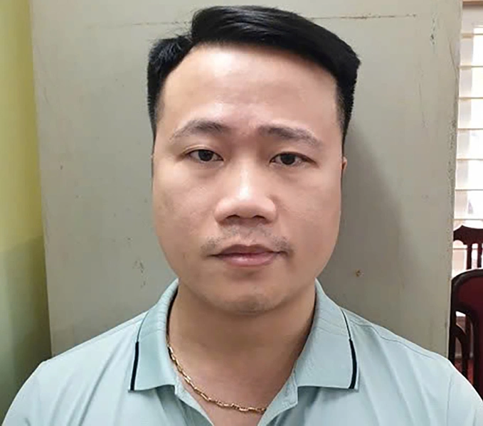 Bùi Quang Minh khi bị bắt. Ảnh: Công an cung cấp