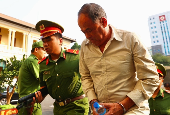 Cựu chủ tịch UBND tỉnh An Giang Nguyễn Thanh Bình trong lần ra tòa hồi tháng 3. Ảnh:Quỳnh Trần
