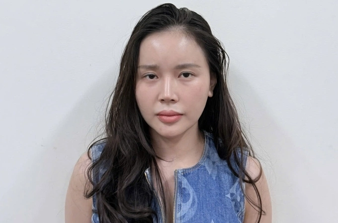 Lê Hương Ly tại cơ quan điều tra. Ảnh: Công an Hà Nội