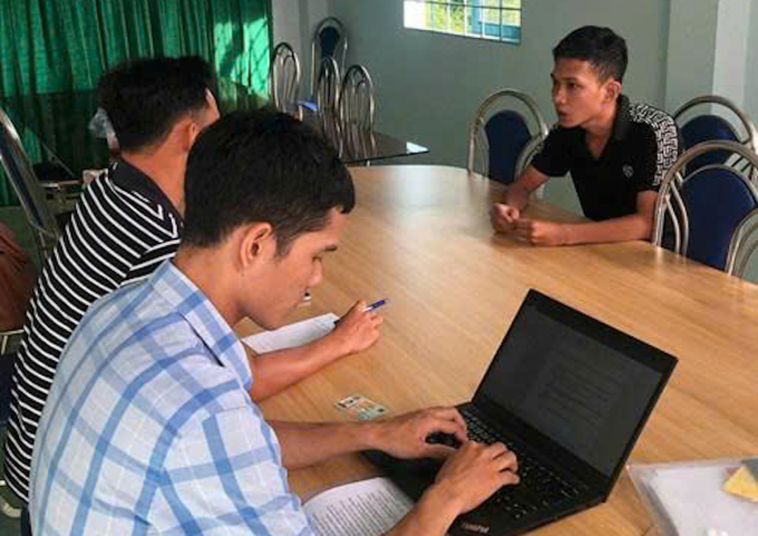Trần Văn Hiếu tại cơ quan điều tra. Ảnh: Công an cung cấp