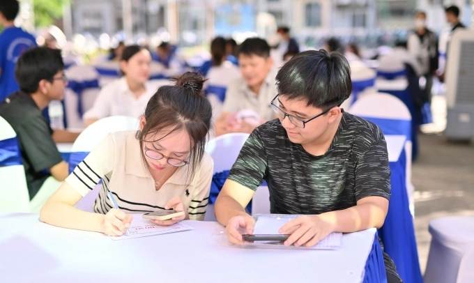 Sinh viên nhập học Học viện Công nghệ Bưu chính viễn thông hôm 4/9. Ảnh: Fanpage học viện