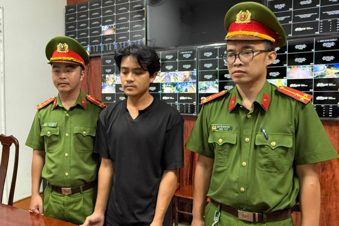 Lê Minh Nhân lúc bị bắt. Ảnh: Ngọc Oanh