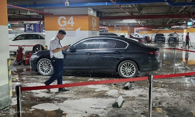Hiện trường ôtô bị cháy đã được khoanh vùng để xử lý sự cố. Ảnh: Đình Văn
