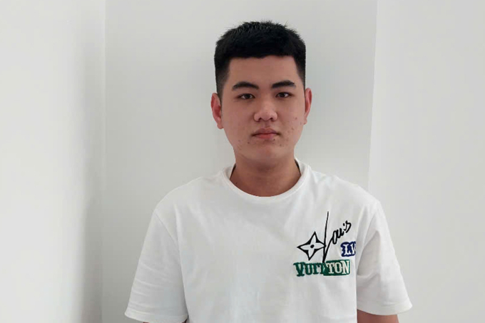 Lê Đan Huy tại cơ quan công an. Ảnh: Anh Văn