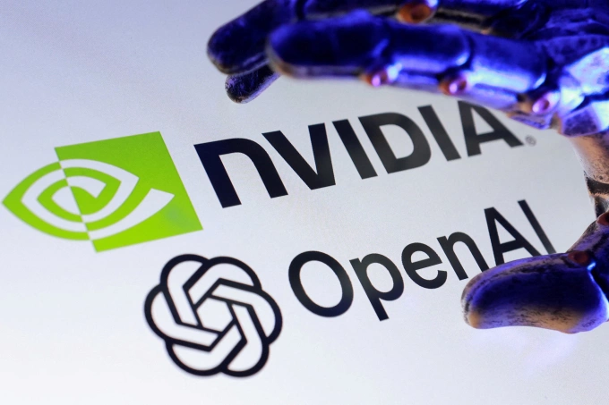 Logo Nvidia và OpenAI hiển thị trên màn hình máy tính. Ảnh: Reuters