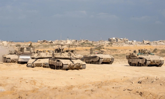Xe tăng, thiết giáp và máy ủi của Israel tại Dải Gaza ngày 11/10. Ảnh: IDF