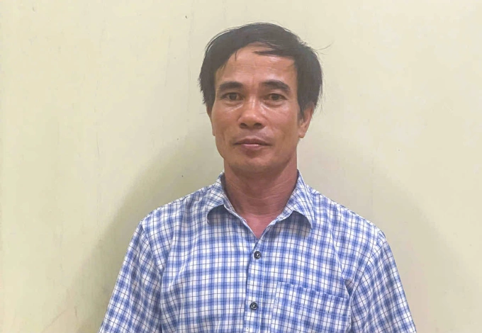 Nguyễn Văn Hòa tại cơ quan điều tra. Ảnh: Hùng Lê
