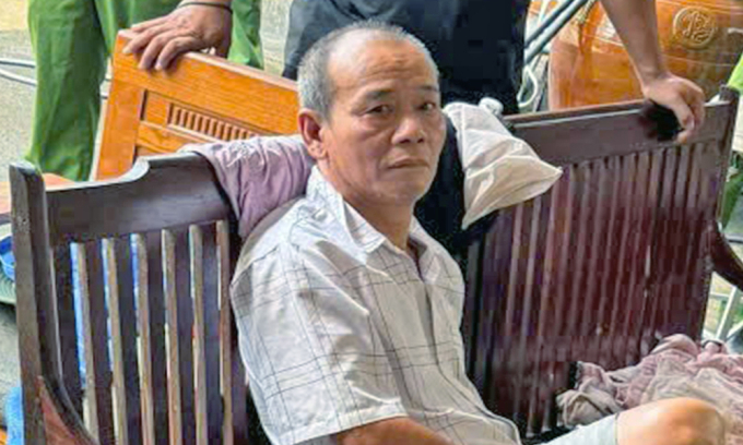 Tuấn lúc bị khống chế. Ảnh: Công an cung cấp