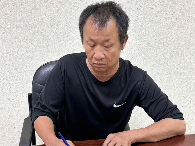 Lê Văn Hỡi tại cơ quan điều tra. Ảnh: Công an TP HCM