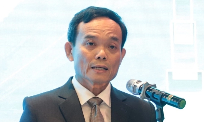 Bí thư Thành uỷ TP HCM Trần Lưu Quang phát biểu tại buổi gặp mặt lãnh đạo trường đại học, tối 8/11. Ảnh: Lê Tuyết