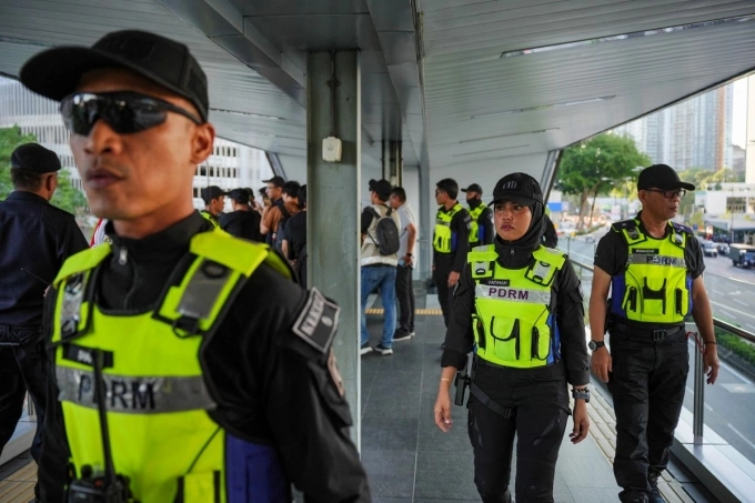 Cảnh sát Malaysia đi tuần trong thời gian diễn ra Hội nghị Cấp cao ASEAN tại Kuala Lumpur ngày 26/10. Ảnh: AFP