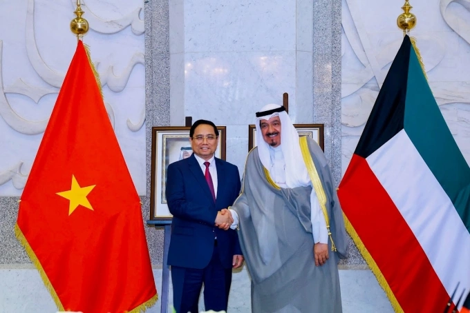 Thủ tướng Phạm Minh Chính và Thủ tướng Kuwait Sheikh Ahmad Al-Abdullah Al-Sabah. Ảnh: VGP