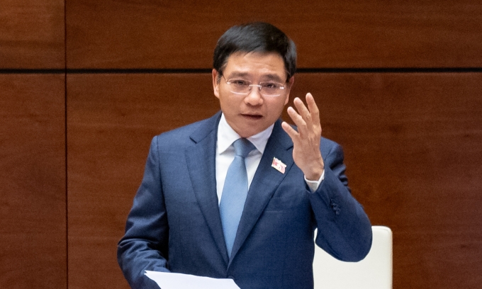 Bộ trưởng Tài chính Nguyễn Văn Thắng giải trình trước Quốc hội chiều 19/11. Ảnh: Đại biểu Nhân dân