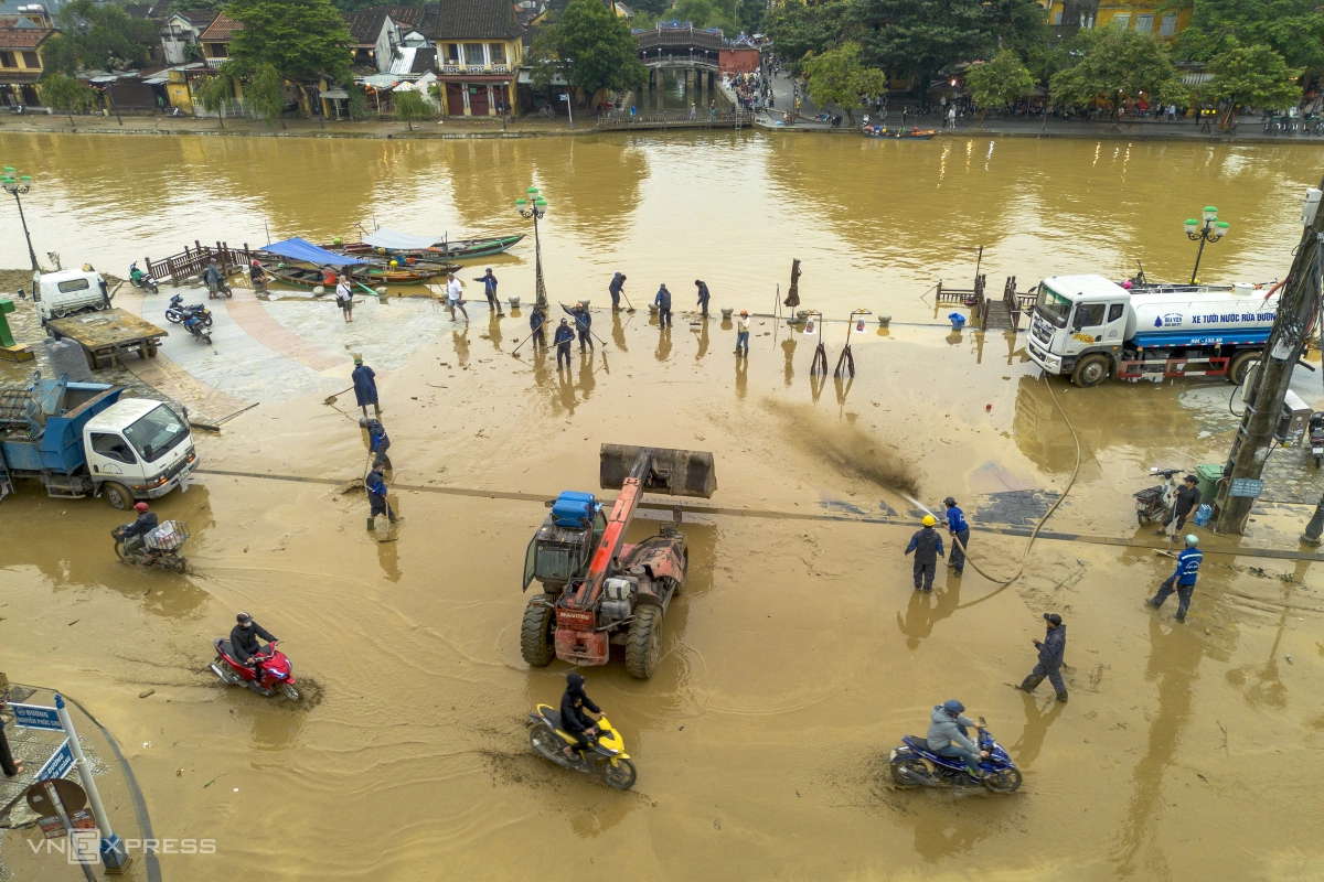 Vietnam's tourist city Hoi An covered in mud as floodwaters recede