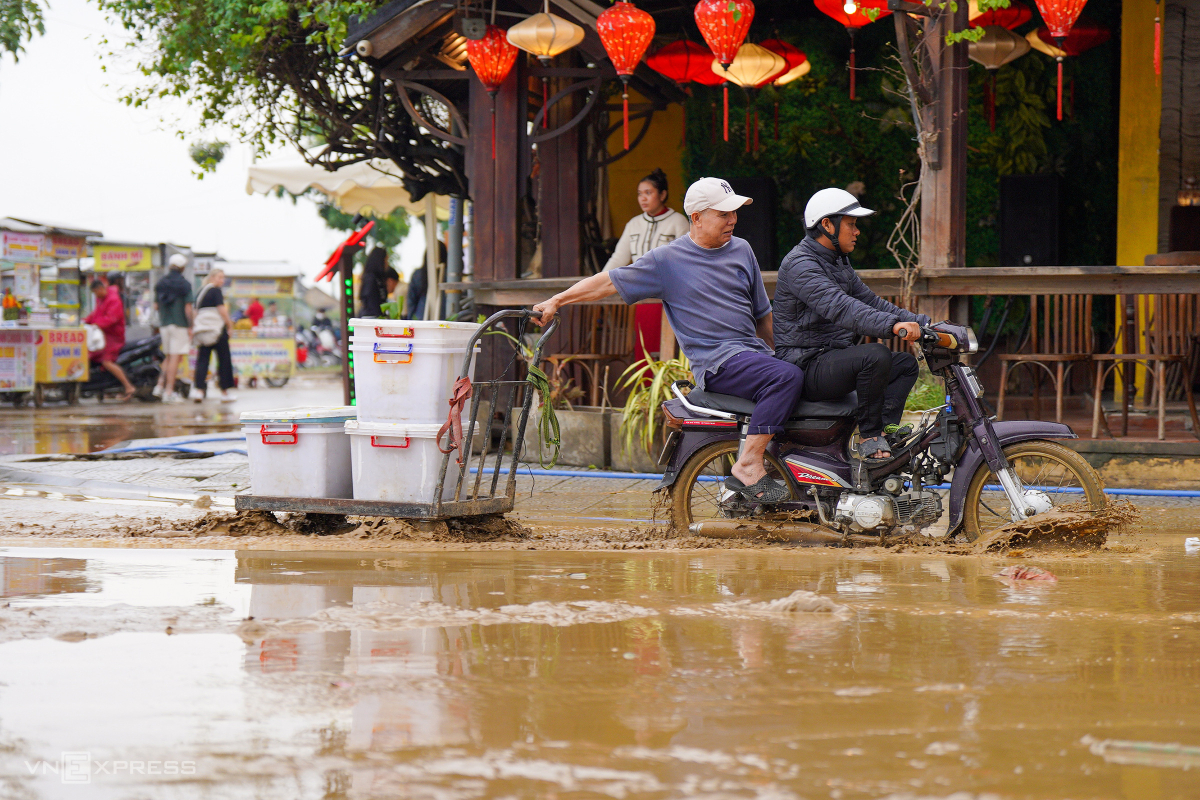 Vietnam's tourist city Hoi An covered in mud as floodwaters recede