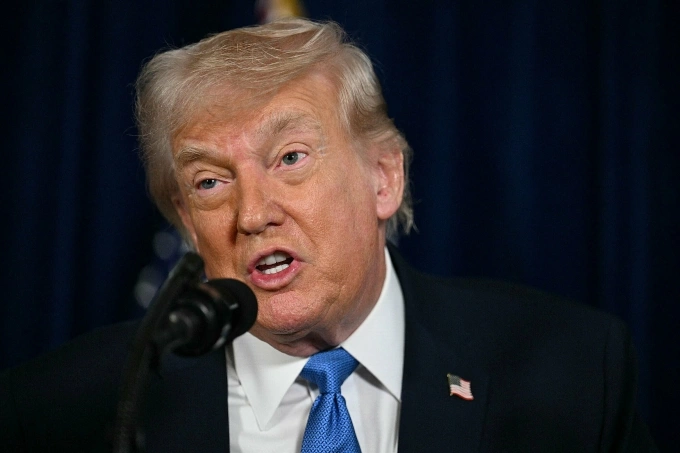 Tổng thống Mỹ Donald Trump trả lời báo chí tại Mar-a-Lago, bang Florida ngày 3/1. Ảnh: AFP