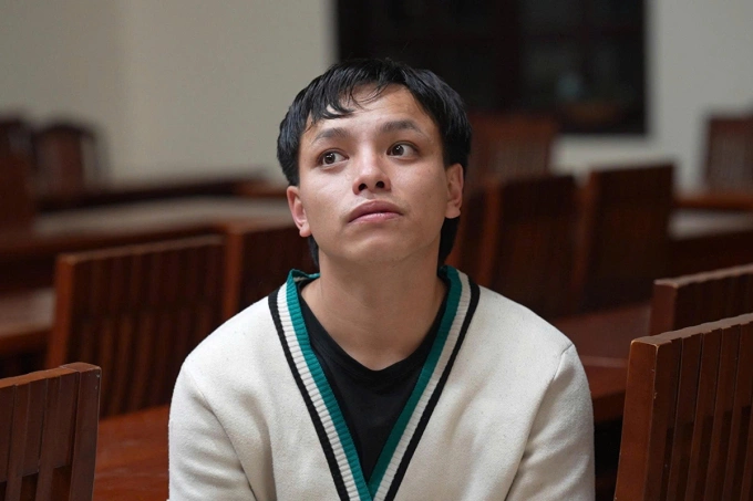 Quốc tại cơ quan công an. Ảnh: Lê Tiến