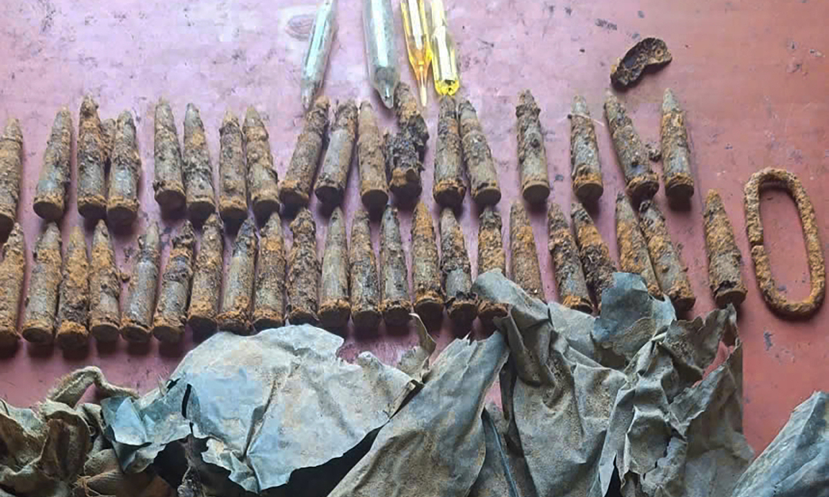 Tìm thấy hài cốt liệt sĩ cùng 45 viên đạn